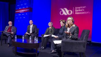 ABA’s Wayne Abernathy, extreme left, moderated a regulator panel during the association’s recent Government Relations Summit. From left to right, panelists included OCC’s Darrin Benhart; FDIC’s Doreen Eberley; the Federal Reserve’s Maryann Hunter; and CFPB’s Peggy Twohig, speaking.